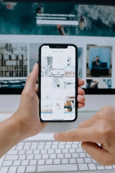 a person scrolling through their phone