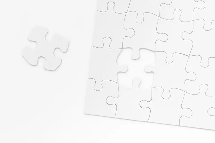 a piece of white puzzle