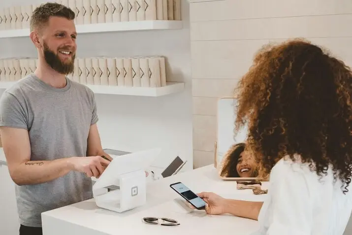 white guy paying his bills