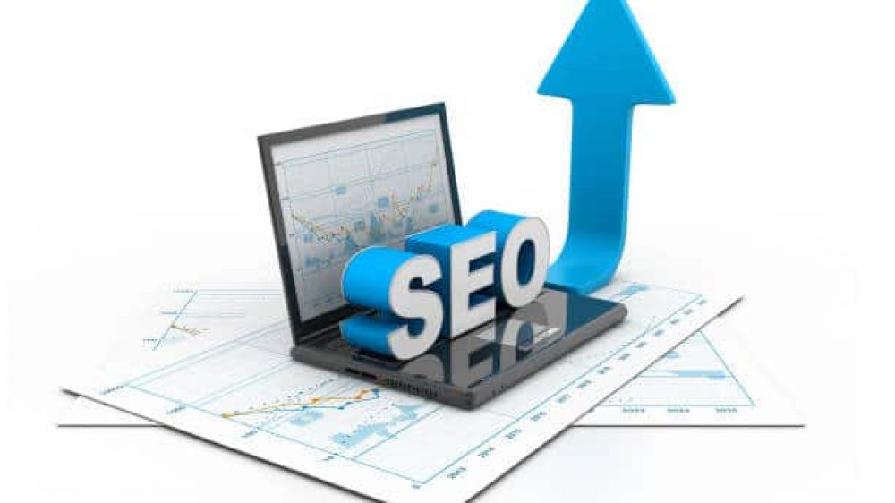 A laptop prominently displaying the term "SEO".
